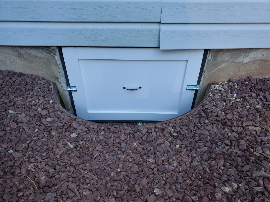 Photo of a custom access door to a crawl space in Easton, Maryland