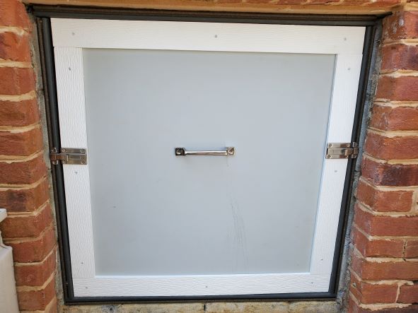 Photo of a crawl space access door installation in Easton, Maryland